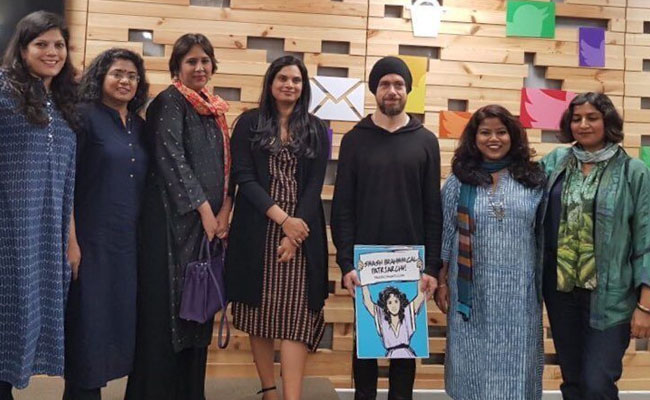 Twitter CEO Jack Dorsey  was pictured with a controversial poster alongside six women